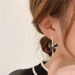 Bông Tai Tòn Teng Khoen Ngọc Trai Phối Nơ Đen Xinh Xắn