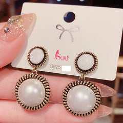 Bông Tai Tòn Teng Khoen 2 Hình Tròn Màu Viền Xoắn Ốc