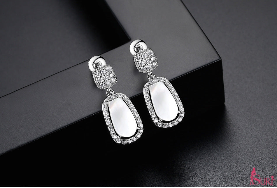 Bông tai tòn teng đá đính xà cừ