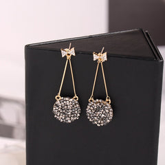 Bông Tai Tòn Teng Nơ Đính Đá Đen Tròn