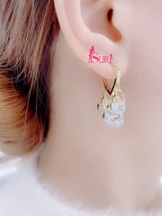 Bông Tai Tòn Teng Khoen Trái Tim Vàng Phối Đá Tròn Trắng Nữ Tính