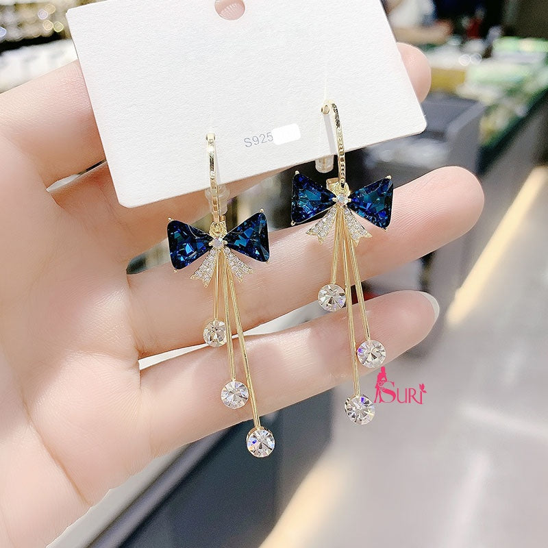 Bông Tai Khoen Tòn Teng Nơ Đá Xanh 3 Hạt Đá Trắng Tua Rua