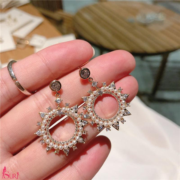 Bông Tai Dáng Hoa Mặt Trời Đính Ngọc Trai