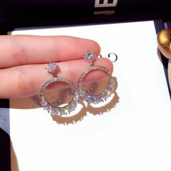 Bông tai tròn đính đá vòng cung