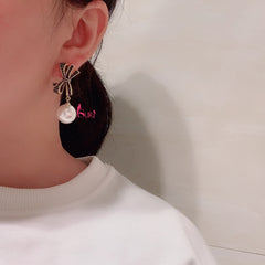 Bông Tai Tòn Teng Nơ Đính Đá Đen Ngọc Trai Trắng