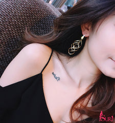 Bông tai tòn teng dạng xoắn sang chảnh