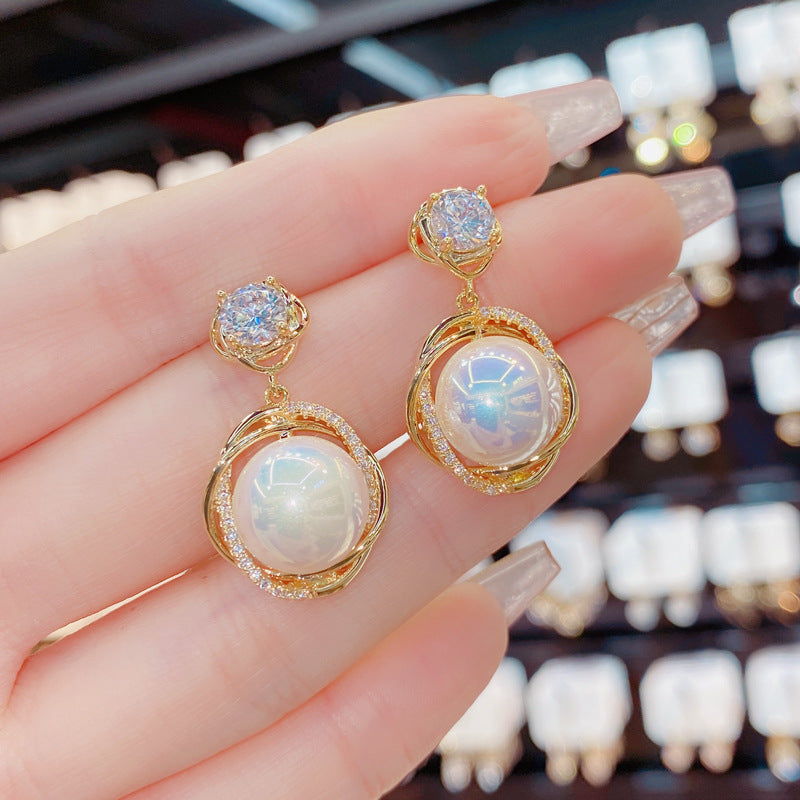 Bông Tai Tòn Teng Hình Hoa Nhụy Đá Ngọc Trai Xoắn Viền Đá Đen