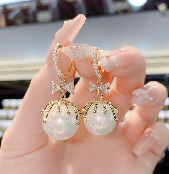 Bông Tai Khoen Nơ Đá Phối 1 Hạt Trai Thời Trang