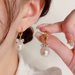 Bông Tai Tòn Teng Khoen Nơ Trái Tim Đá Ngọc Trai