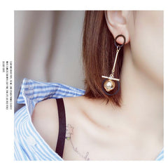 Bông tai tòn teng tròn bất đối xứng