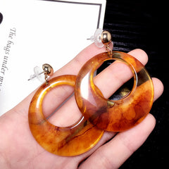 Bông tai đá tròn to