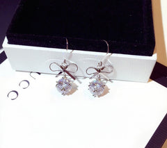 Bông tai tòn teng nơ đính đá trắng