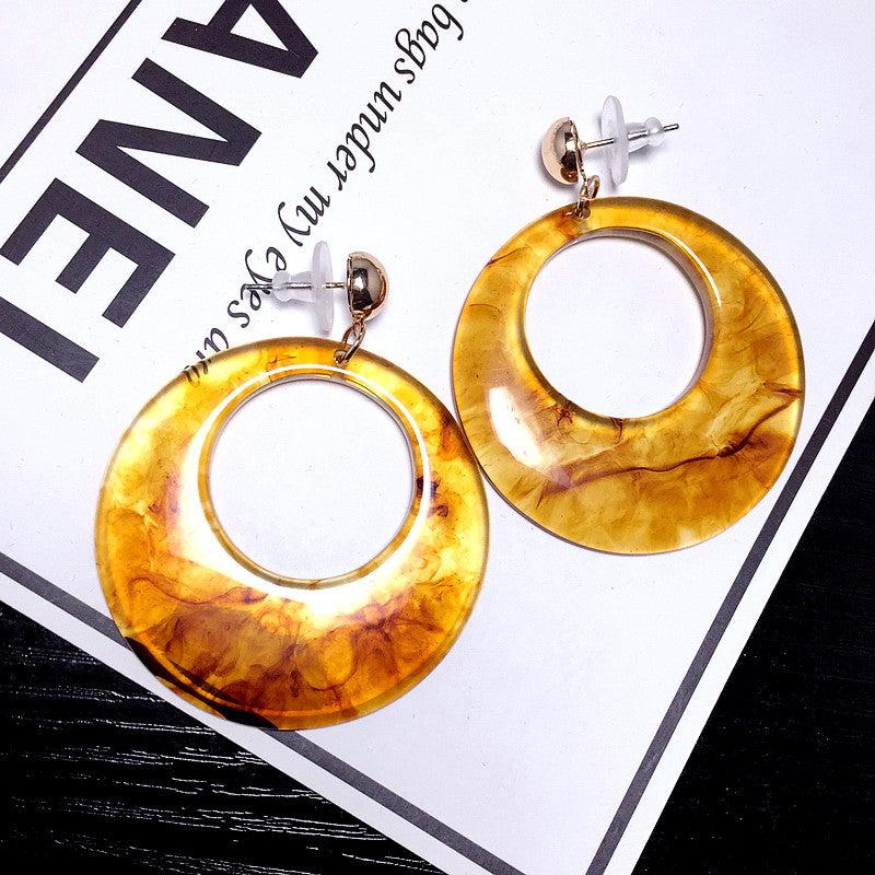 Bông tai đá tròn to