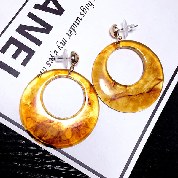 Bông tai đá tròn to