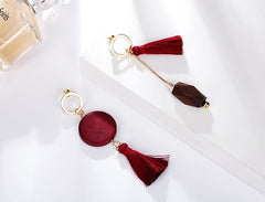 Khuyên tai tòn teng bất đối xứng hình học đỏ đô