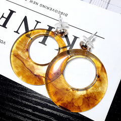 Bông tai đá tròn to