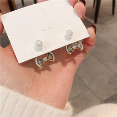 Bông Tai Nơ Đá Xám Viền Đá Đính Ngọc Trai