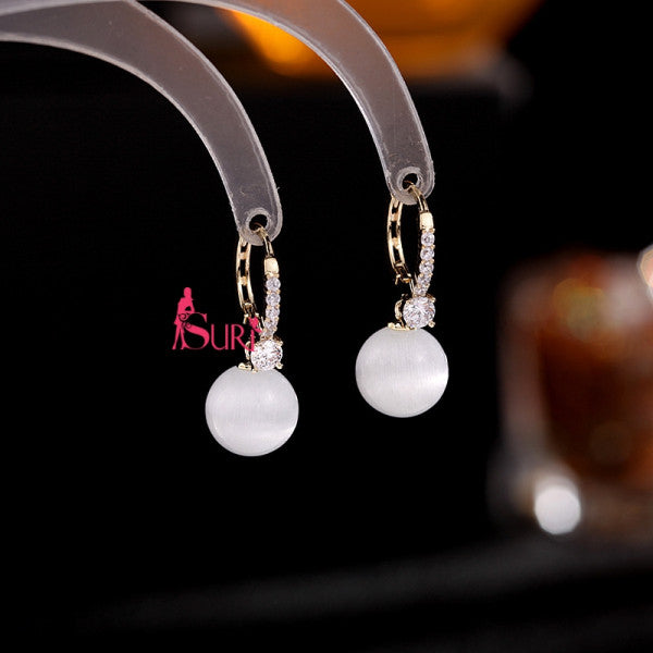 Bông Tai Tòn Teng Khoen Tròn Đính 1 Hạt Đá Mắt Mèo Xinh Xắn