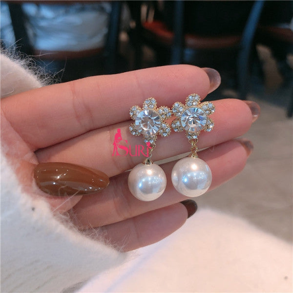 Bông Tai Tòn Teng Đá Tròn Hoa Đá 6 Cánh Trắng