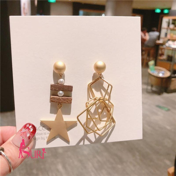 Bông Tai Tòn Teng 2 Bên Đối Lập Lạ Mắt