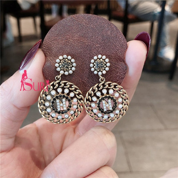 Bông Tai Tòn Teng Khoen Chữ N Ngọc Trai Phối Đá Đen