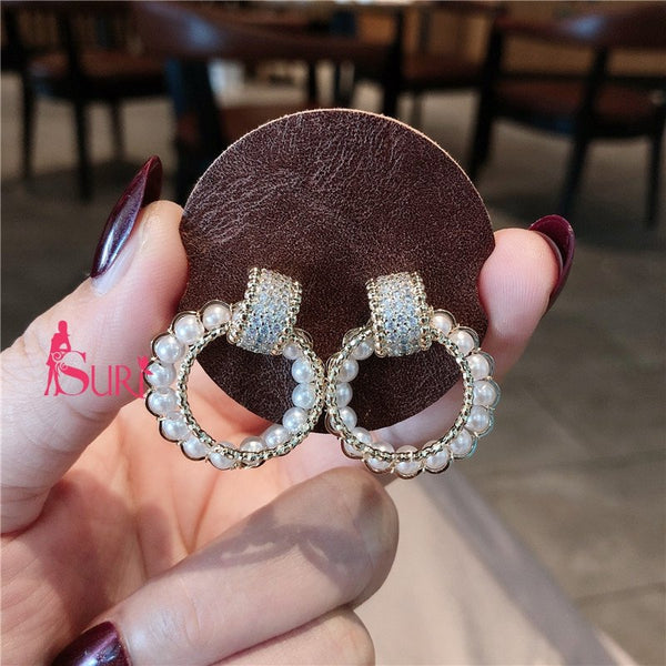 Bông Tai Tòn Teng Khoen Vàng Viền Ngọc Trai Trắng