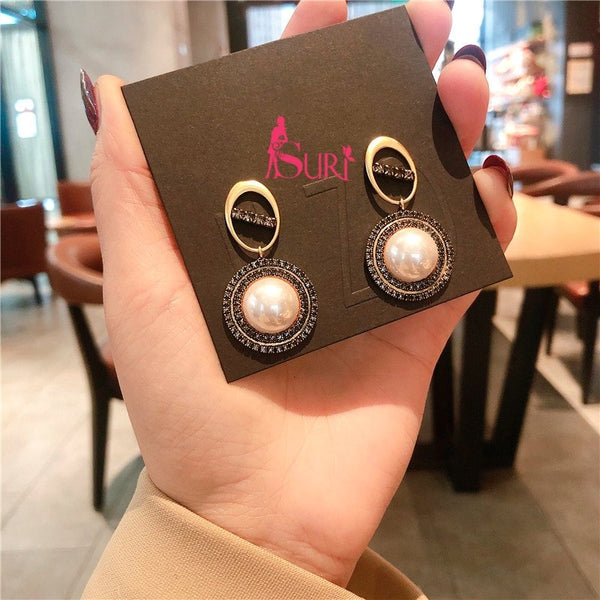 Bông Tai Tòn Teng Quả Cầu Ngọc Trai Viền Đá Đen 2 Lớp